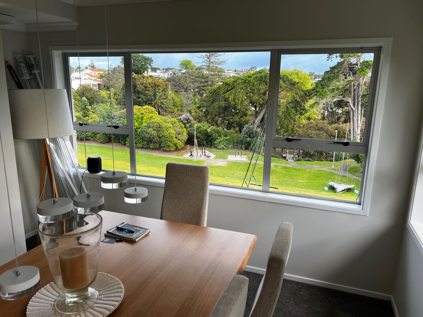 Coffee on the dining table, the reserve through the window