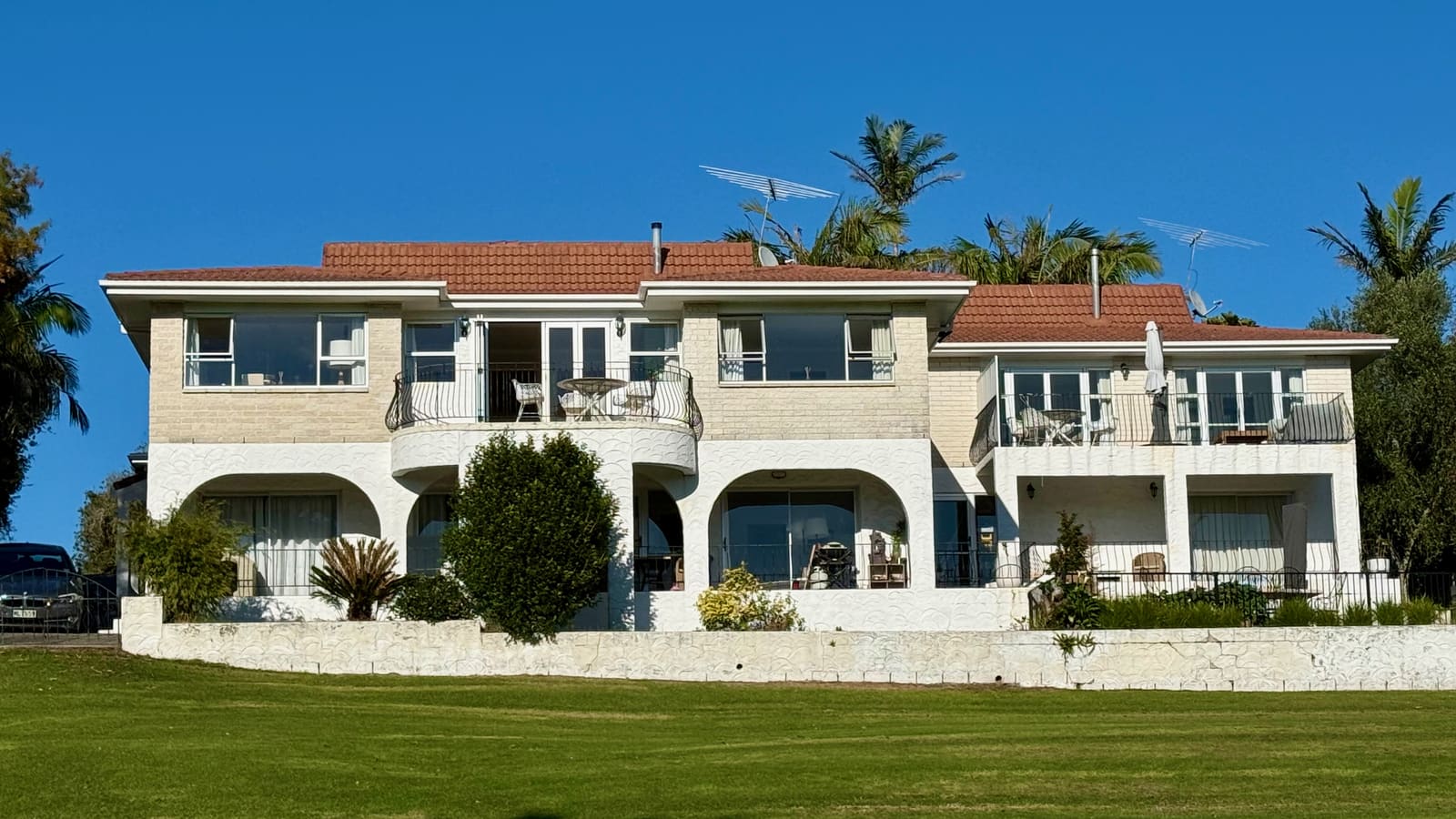 The whole house from the reserve lawn, both apartments under one roof
