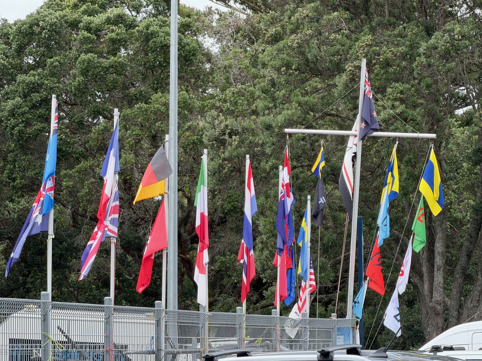 International flags flying at the sailing club