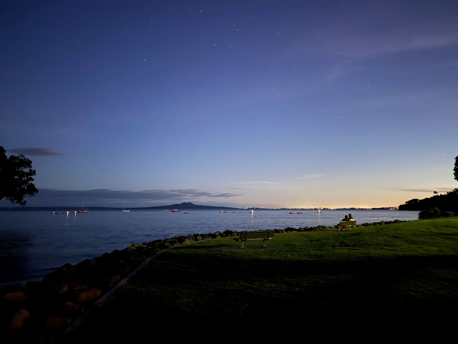 Stars over the bay at blue hour